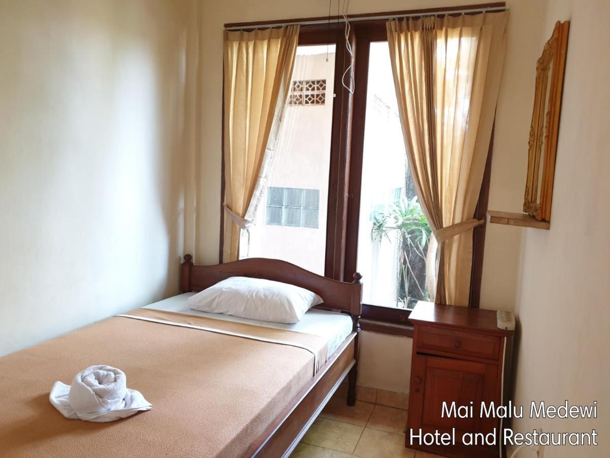 Mai Malu Apartment Pulukan Bagian luar foto