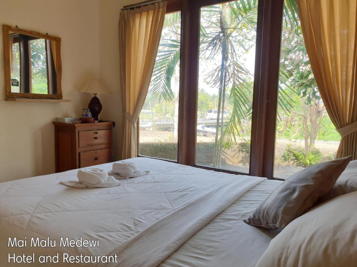 Mai Malu Apartment Pulukan Bagian luar foto